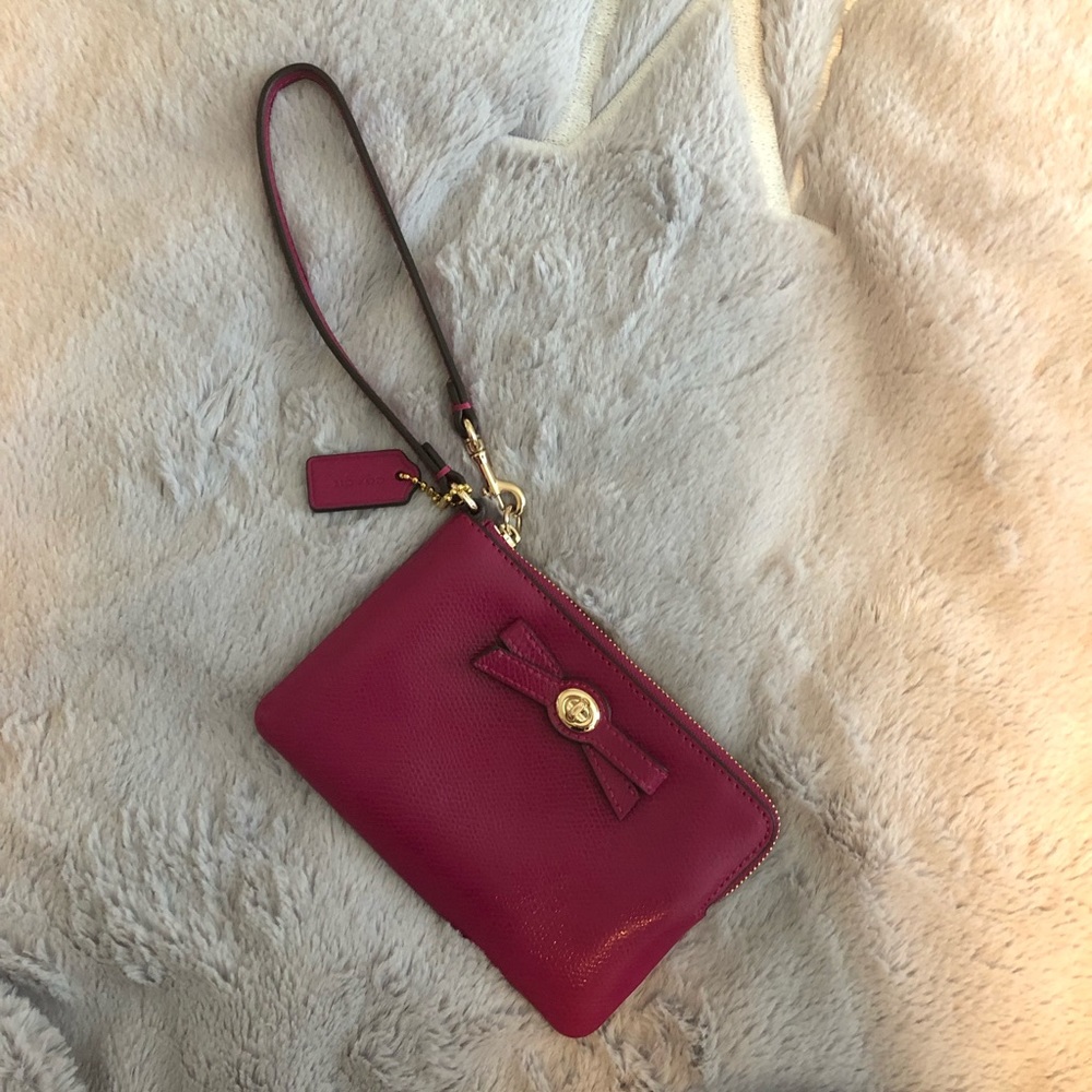 Coach fuchsia wristlet